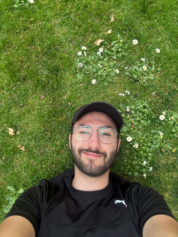 Man rests among daisies in Mexico park setting