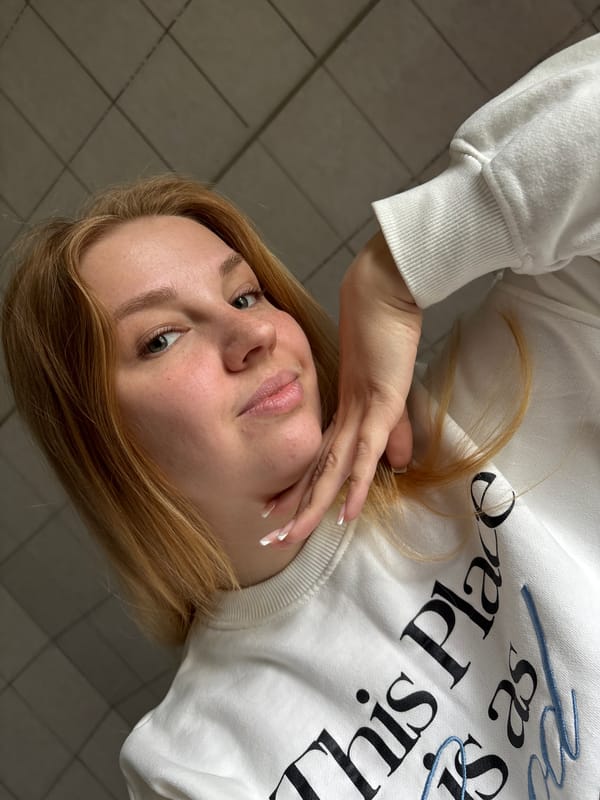 Woman photographed in casual pose in Rusanovo, Russia