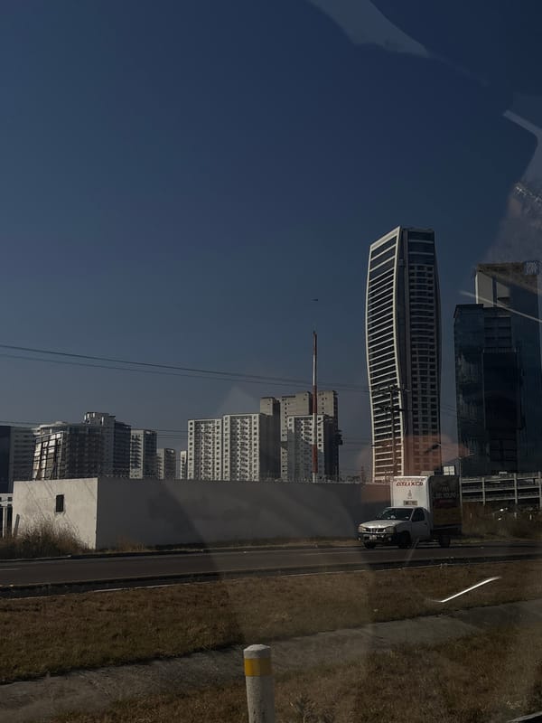 Distorted reflection of high-rise buildings captured in Mexican city