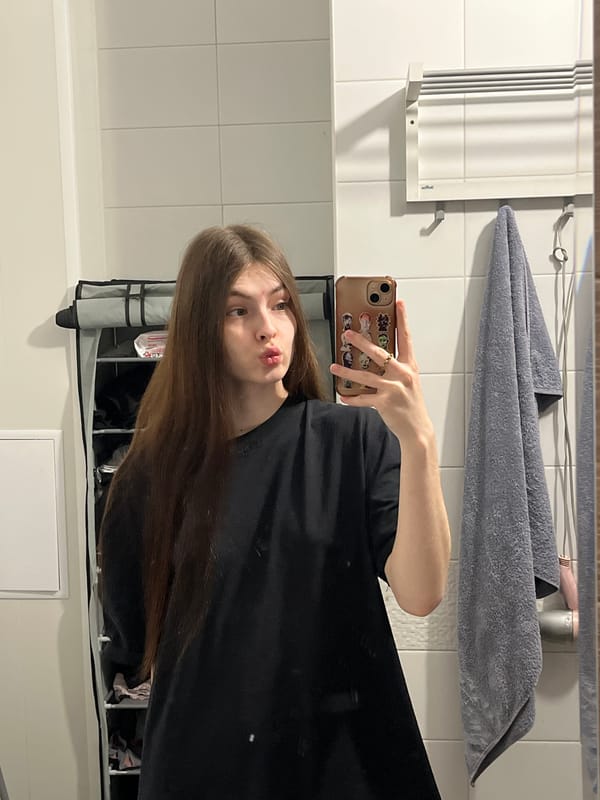 Woman takes selfies during late-night photo session in Saint Petersburg