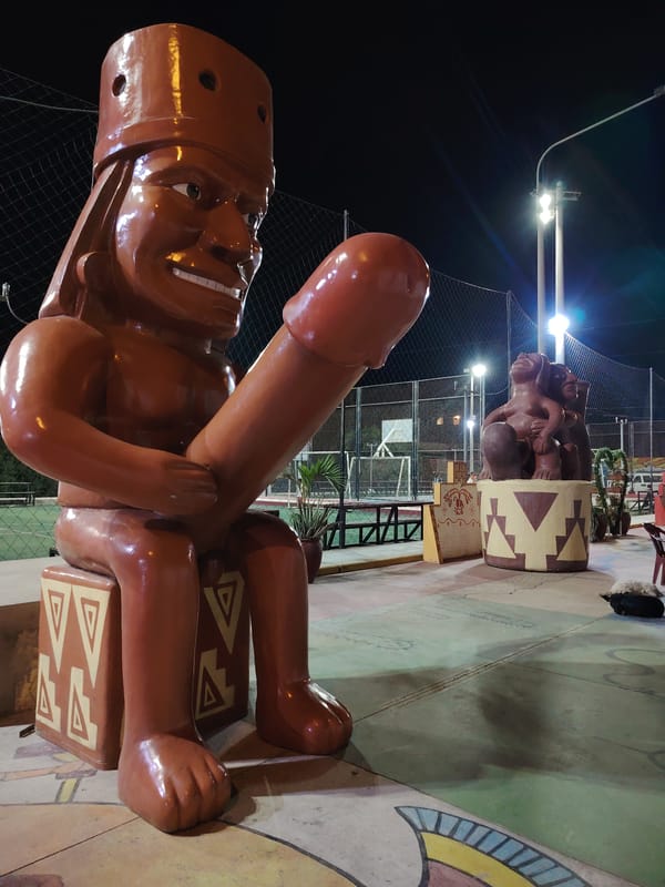 Children enjoy late-night carnival rides in Trujillo, Peru