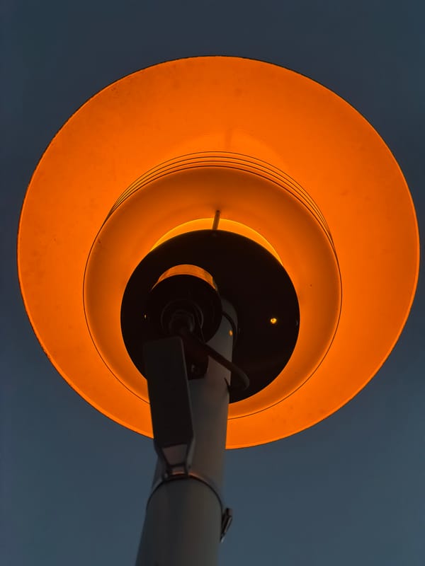 Moscow park at dusk: playgrounds, street lights, and evening atmosphere