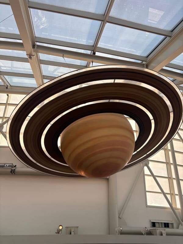 Chicago visitor documents planetary exhibits and lakefront sundial sculpture