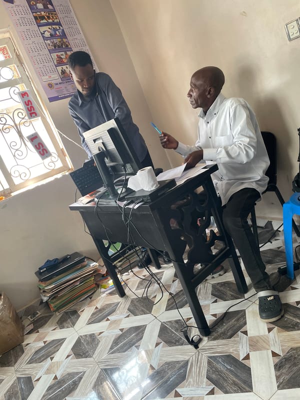 Midday life in Gura Top: streets, market, school, and office