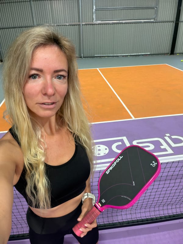 Pickleball session at a Da Lat court, inside and out