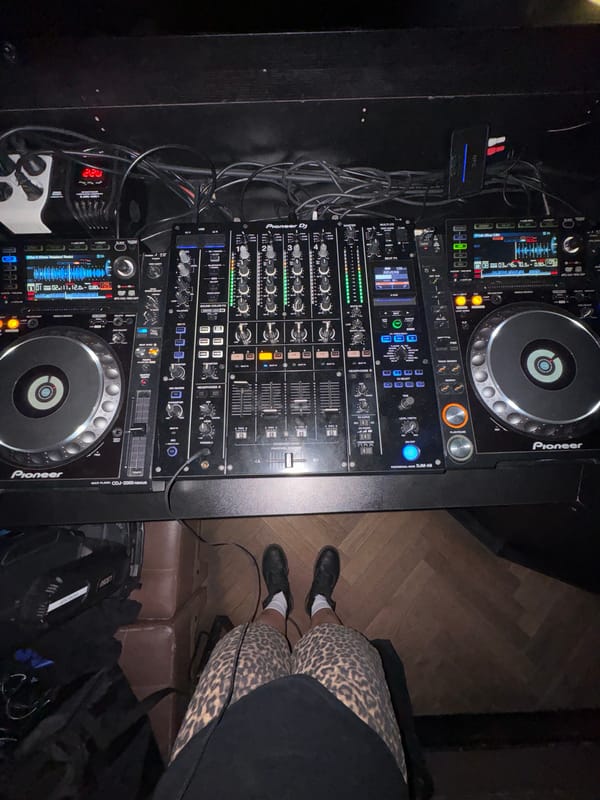 Live DJ set at a Moscow club, disco ball and all