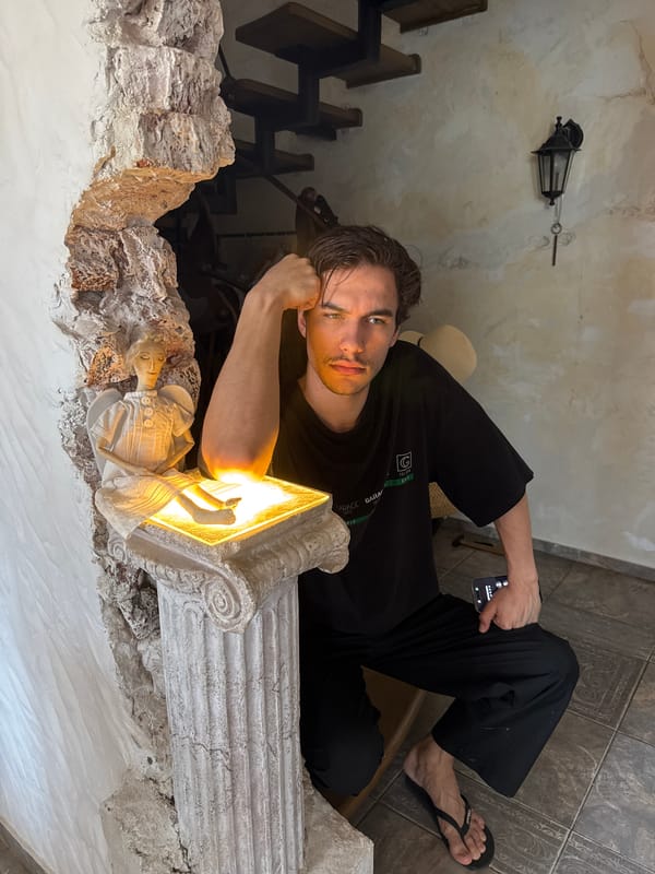Young man photographed in multiple indoor poses in Sevastopol