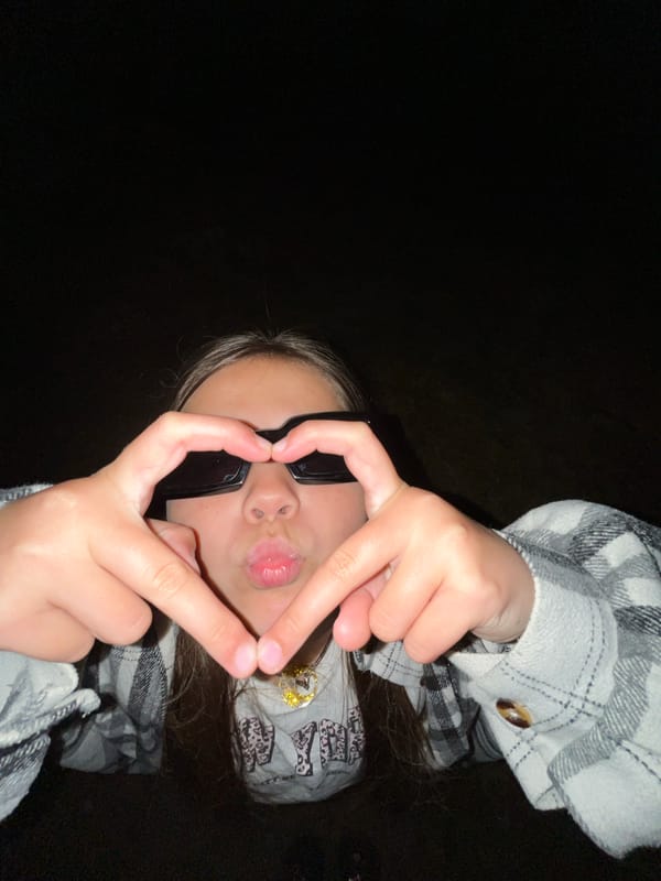 Young people pose with sunglasses in nighttime Russia photo session