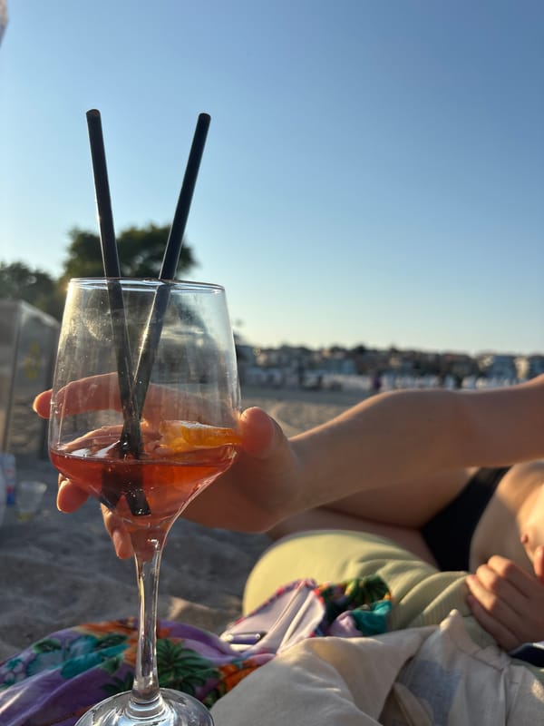 Drinks and golden-hour light on a Sozopol beach.