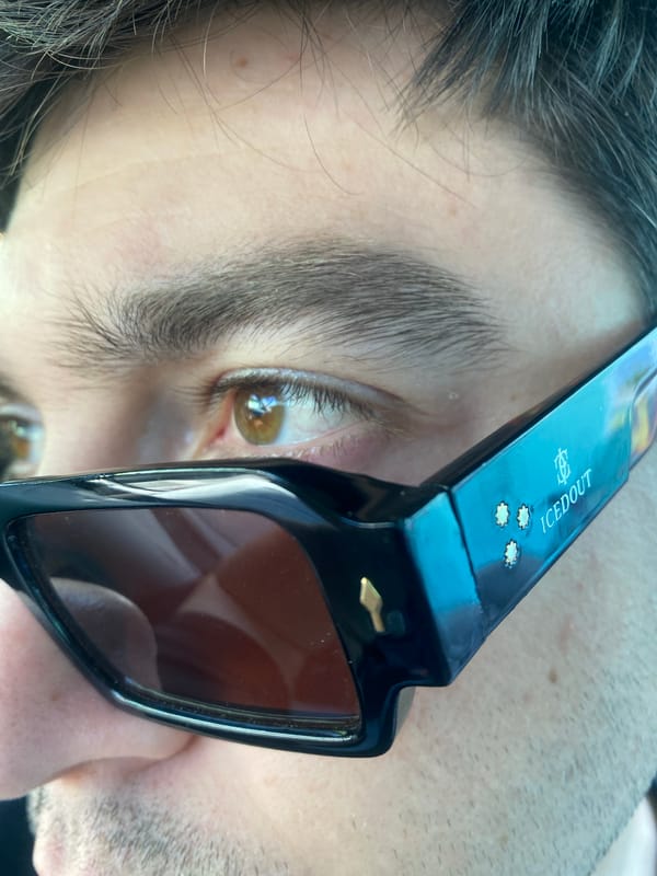Person in branded sunglasses photographed in Varna, Bulgaria