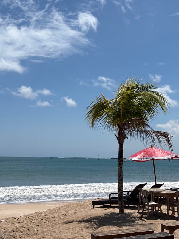 Kuta Indonesia scenes show beach tourism alongside waste management operations