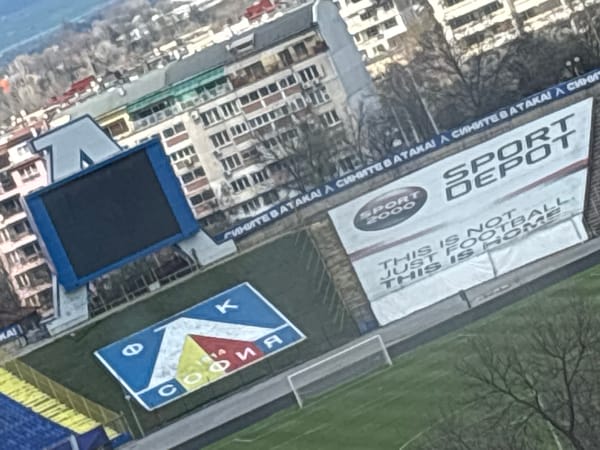 Stadium in Sofia displays large emblem with city name, 1914