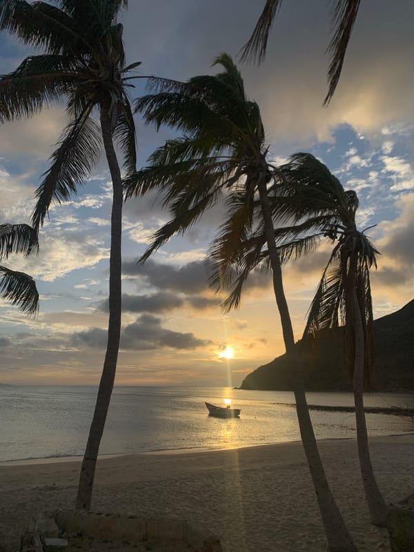 Golden hour settles over Juan Griego's quiet fishing bay