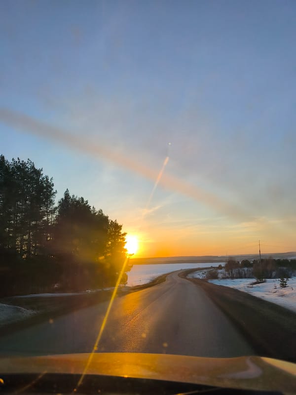 Driver captures sunset road journey near Lubyanki, Russia