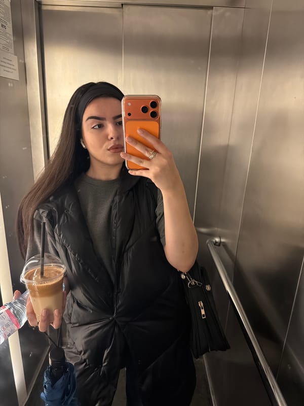 Woman takes elevator selfie in Sofia, Bulgaria