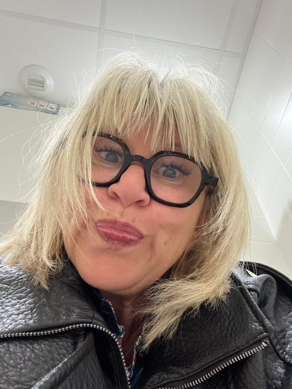 Woman in glasses photographed in La Fouillouse, France
