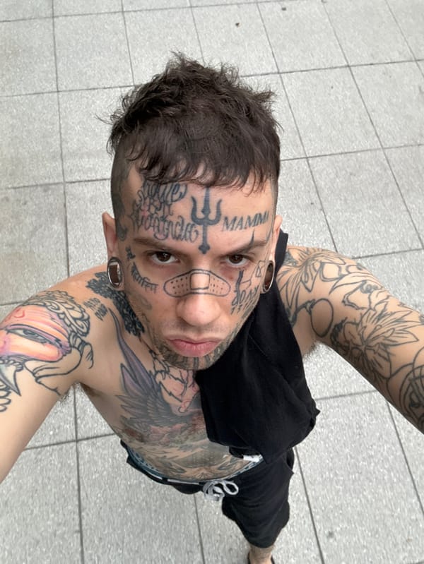 Buenos Aires residents share evening moments with tattooed companion, cat