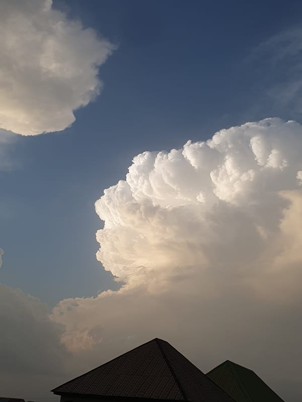 Partly cloudy skies with cumulus clouds observed