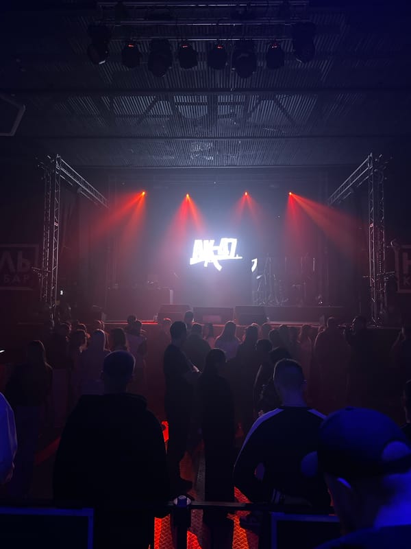 Concert with red lighting captured in Izhevsk venue