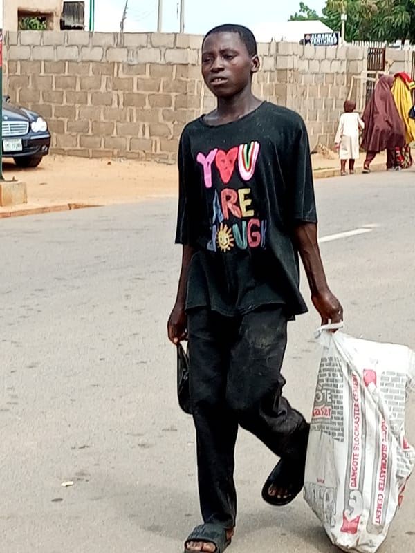 Midday street life and school traffic across northern Nigeria
