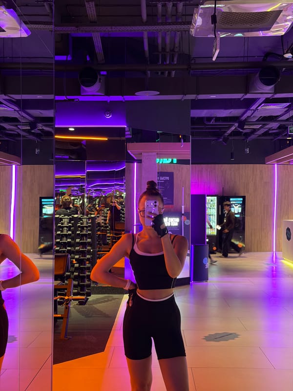 Woman documents workout session at modern Podolsk gym