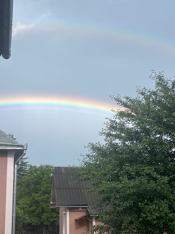 Double rainbow over gardens and orchards in Dubivtsi, Ukraine