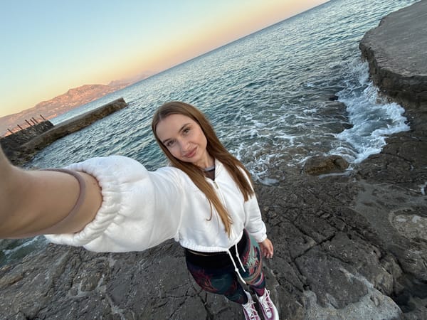Woman documents coastal visit with selfies in Seoca Montenegro