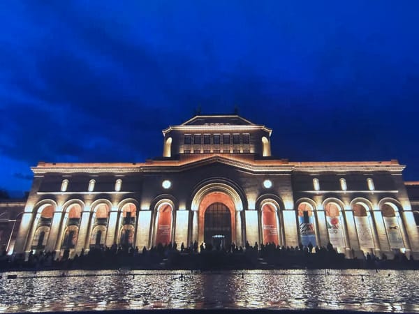 Republic Square and the National Gallery lit up at dusk
