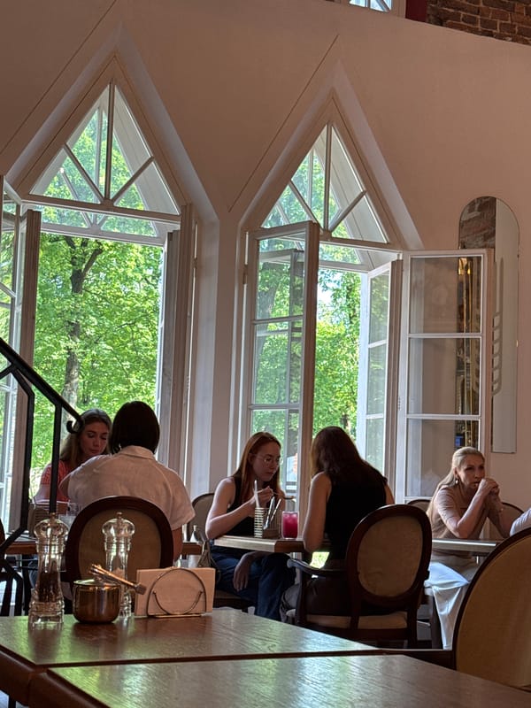 Tourists explore Catherine Park landmarks during summer afternoon in Pushkin