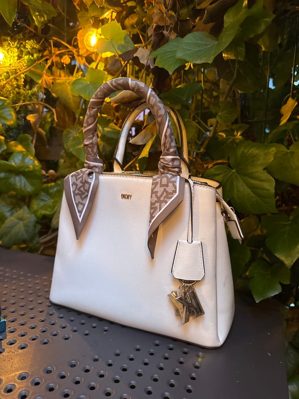 Evening scenes captured at establishment with handbag, cocktails, lighting