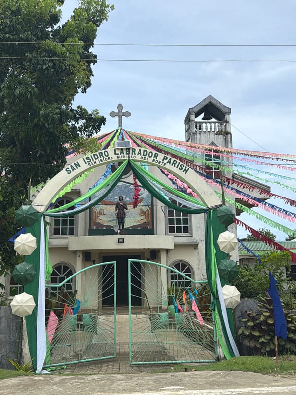 Philippines church decorated with colorful buntings and umbrellas