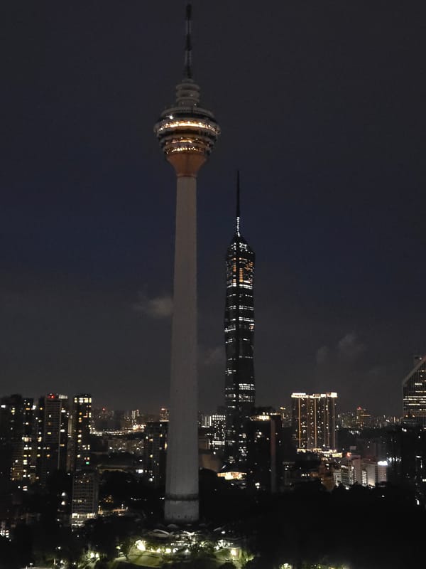 KL city lights and street-level details on a late night out