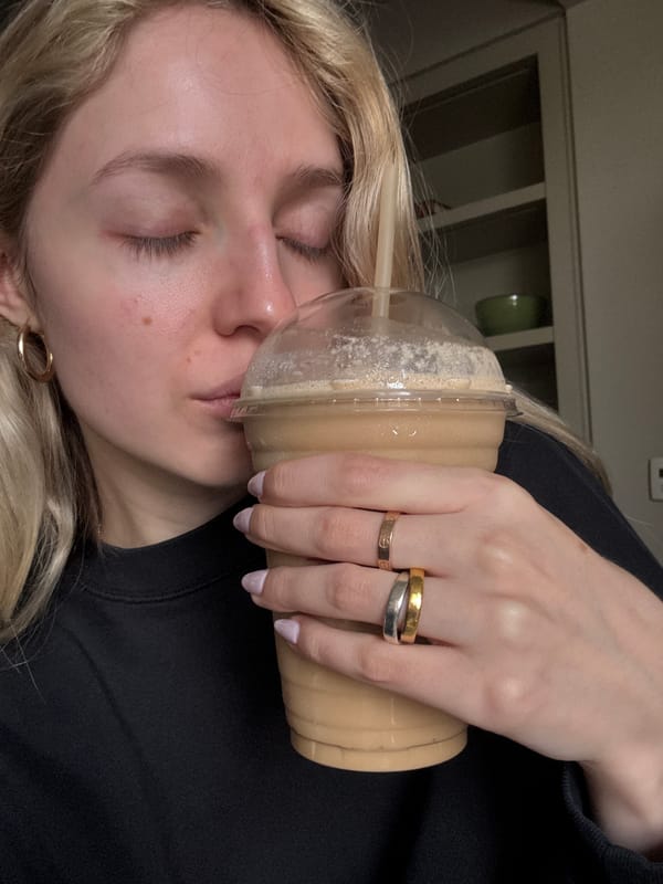 Woman relaxes with coffee drink in Mexico City home