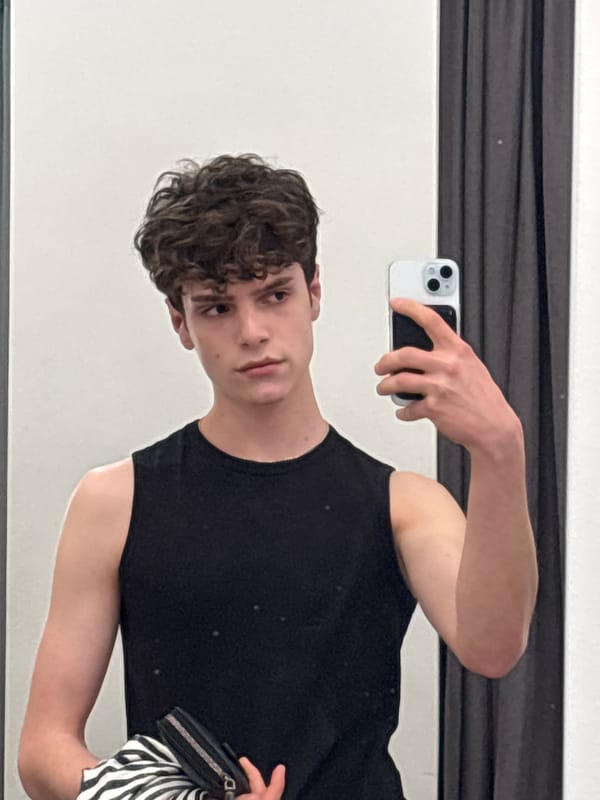 Young man takes selfies around Gyumri, Armenia