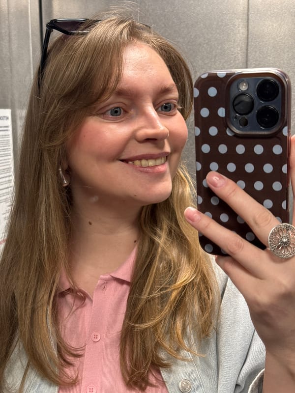 Woman takes selfies at hair salon in Izhevsk