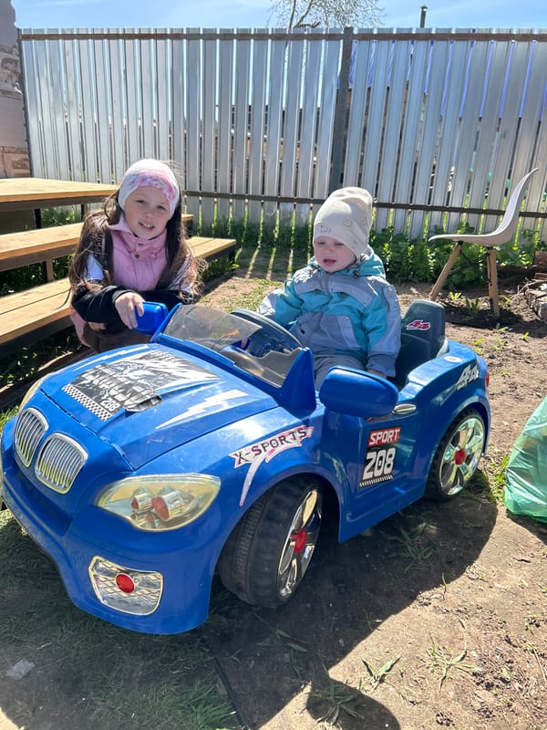 Spring morning play captured in Chaikovsky, Russia backyards