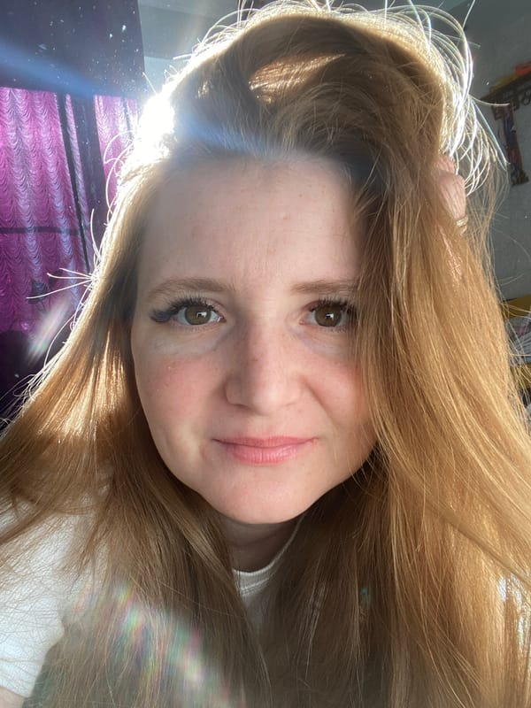Woman takes selfie in Chaikovsky, Russia early morning