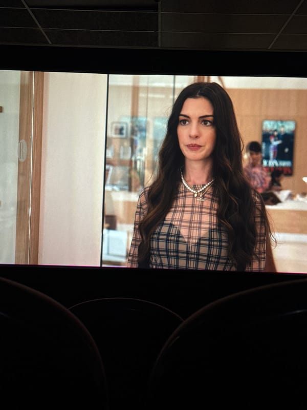 Two women attend movie theater in Lesnoi Gorodok