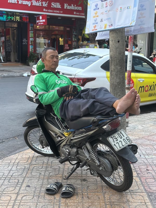 Midday street life in Nha Trang, lanterns and all