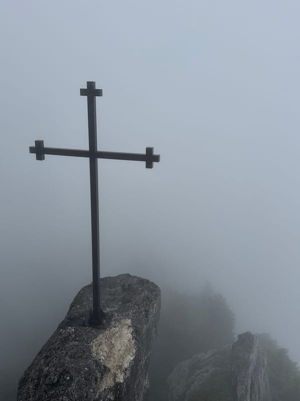 Foggy cross-marked rocky outcrop in Dzirovani, Georgia
