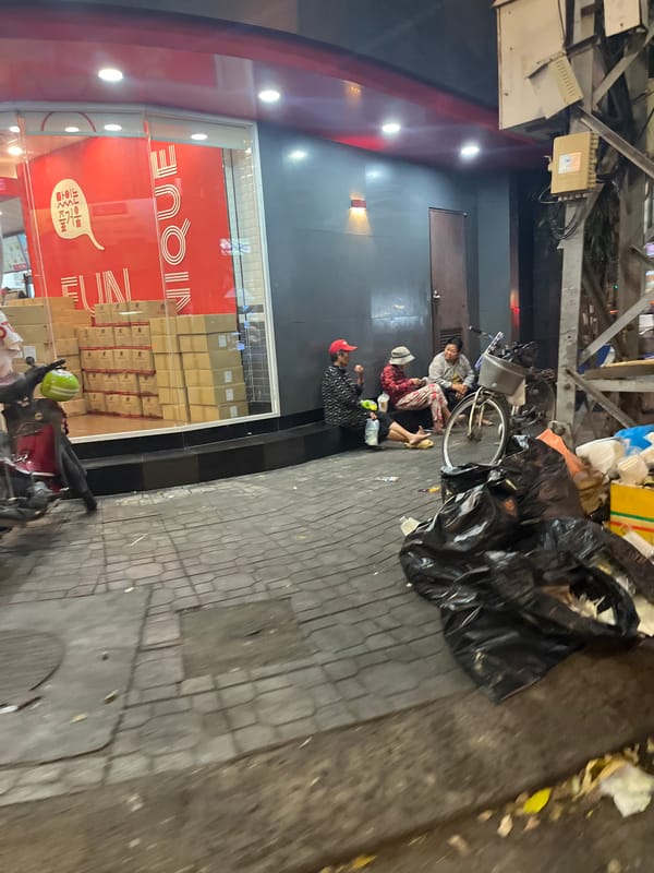 Street life captured in Nha Trang Ward sidewalk scenes
