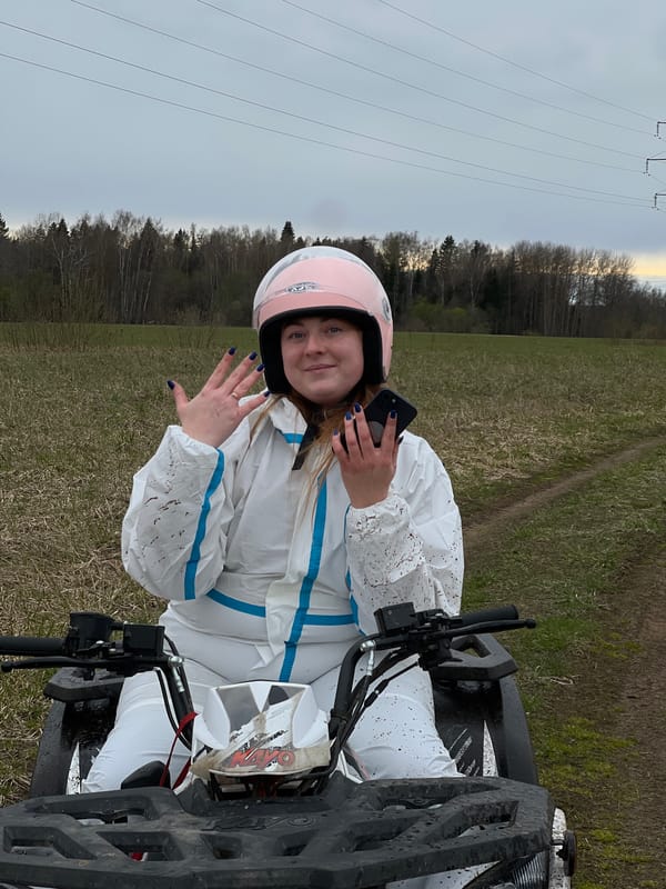 ATV rider in protective gear spotted in Russian field