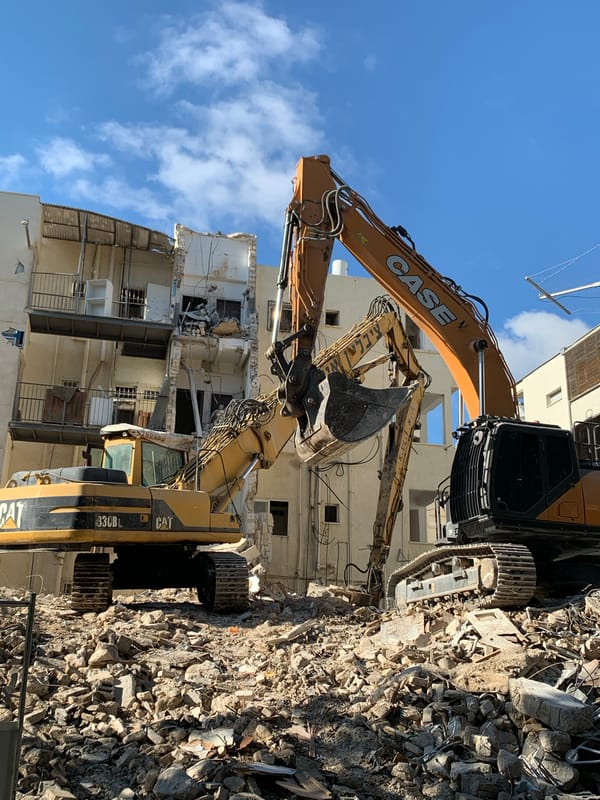 Ordinary Tel Aviv moments: demolition, street cleaning, dogs, gelato