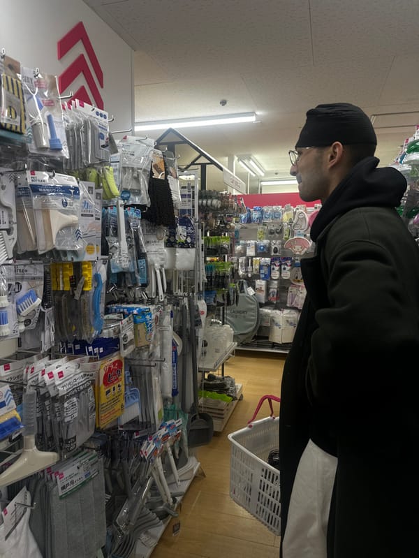 Shopper browses merchandise at Shinagawa retail store