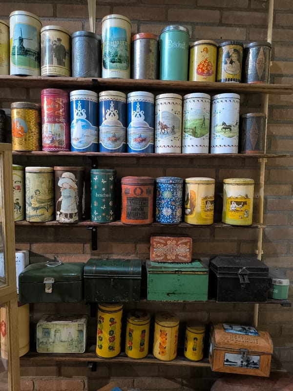 Traditional Dutch baker works amid vintage equipment in Medemblik