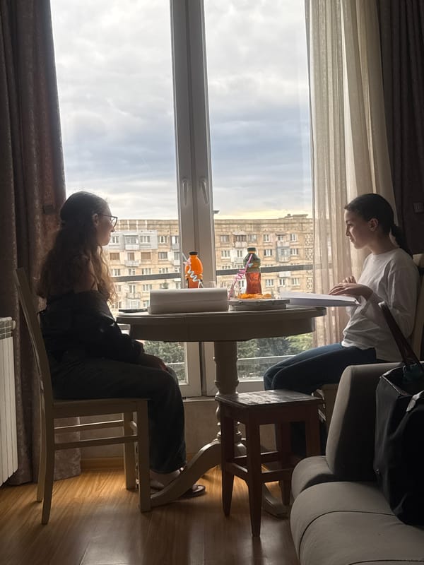 Everyday moments captured across Tbilisi dining and street scenes