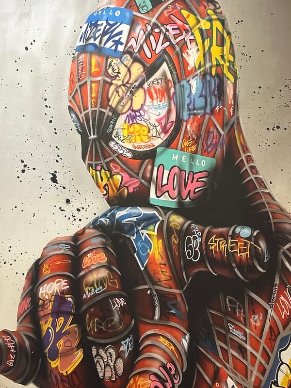 Close-up details of a vivid Spider-Man mural in Espoo