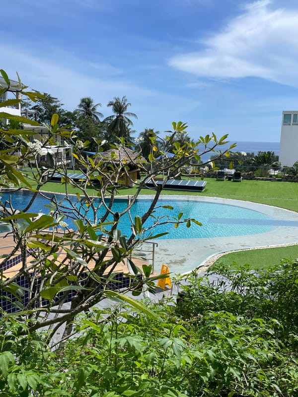 Karon resort grounds on a clear tropical morning