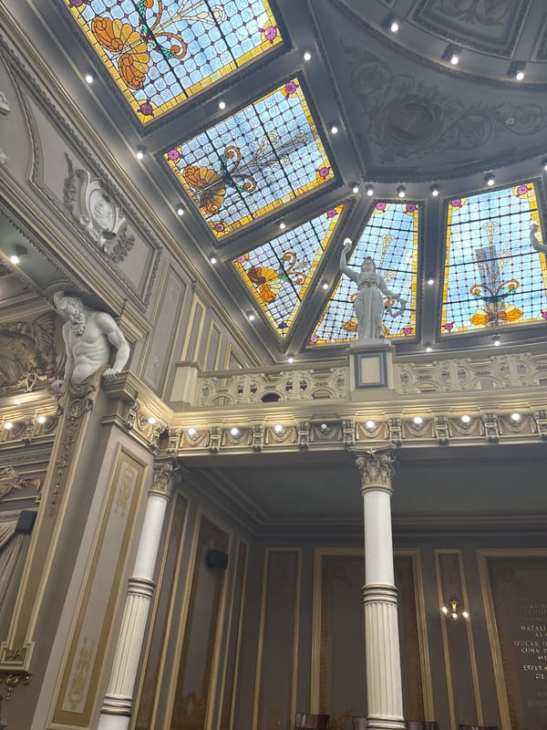 Ornate stained glass ceiling documented in Puebla building