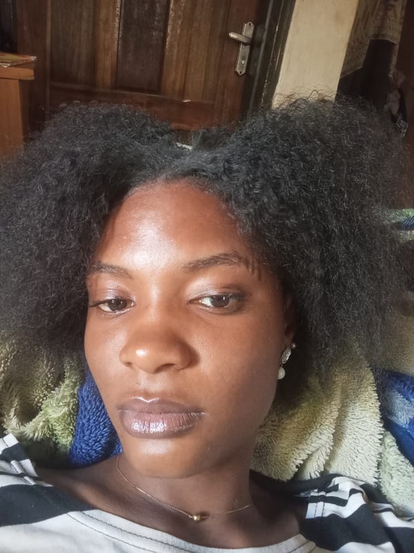 Young woman photographed multiple times across Jos, Nigeria